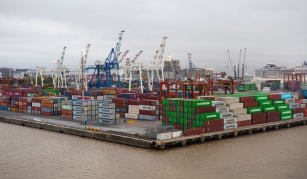 shipping port with stacked cargo containers