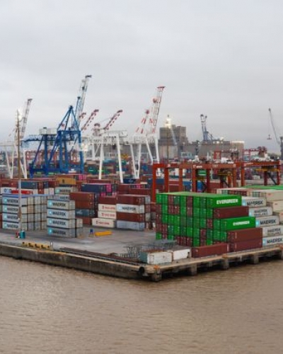 shipping port with stacked cargo containers